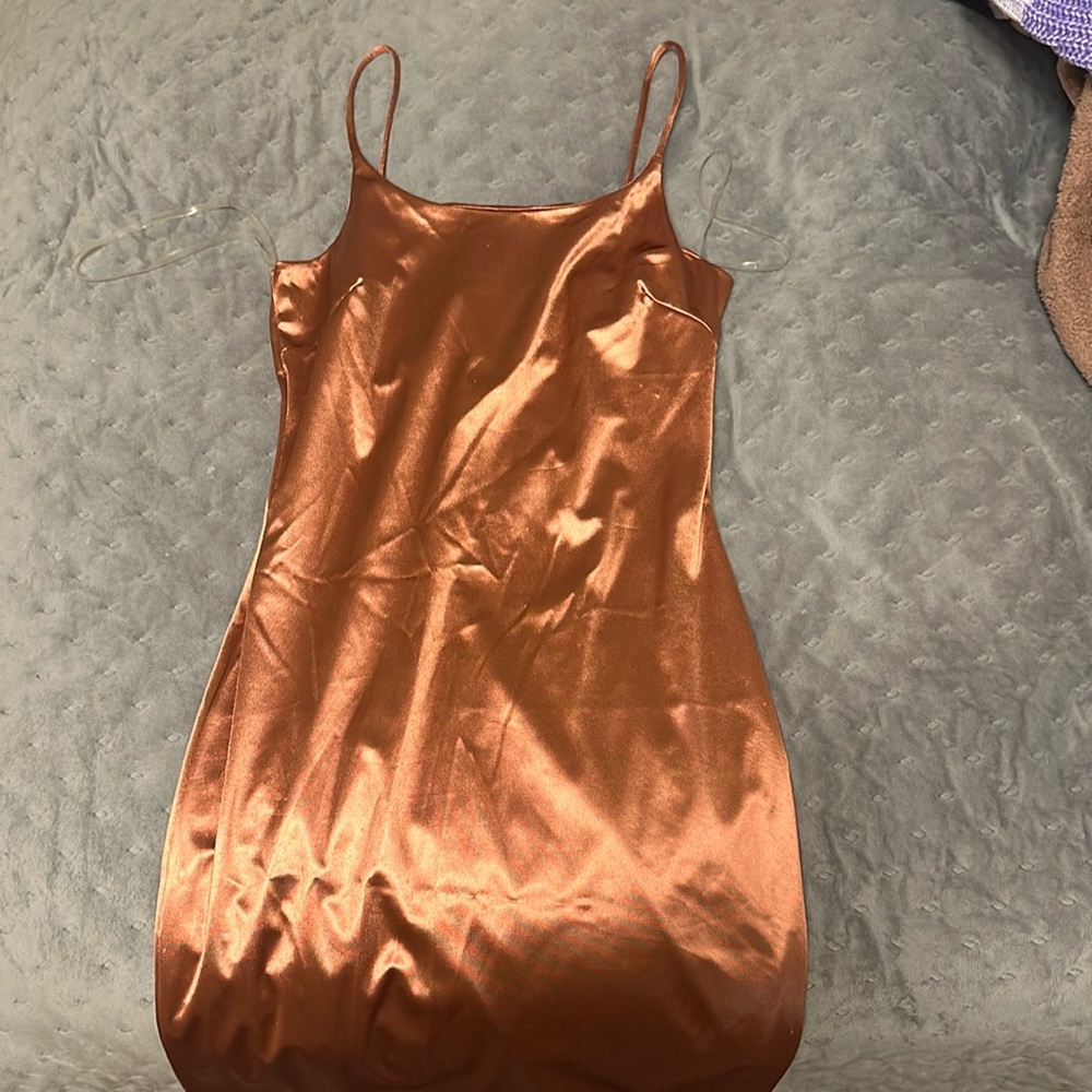 I am selling a short dress brownish purple size L but will fit M